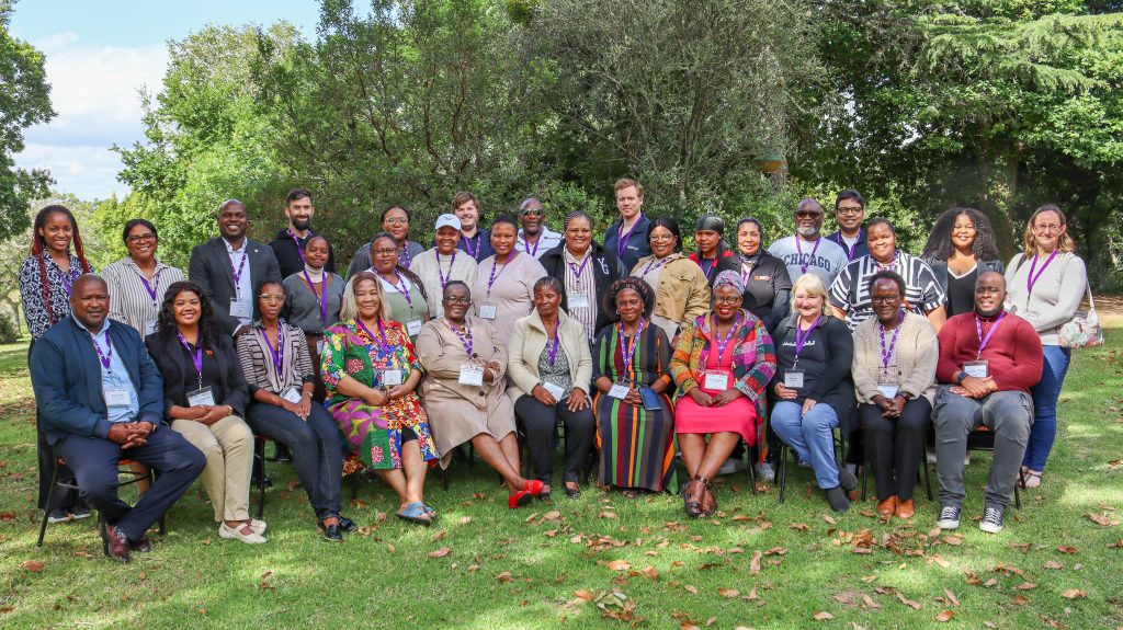 Group photo with the entire team (30+ people), outside at the DISPACT Co-Design workshop.